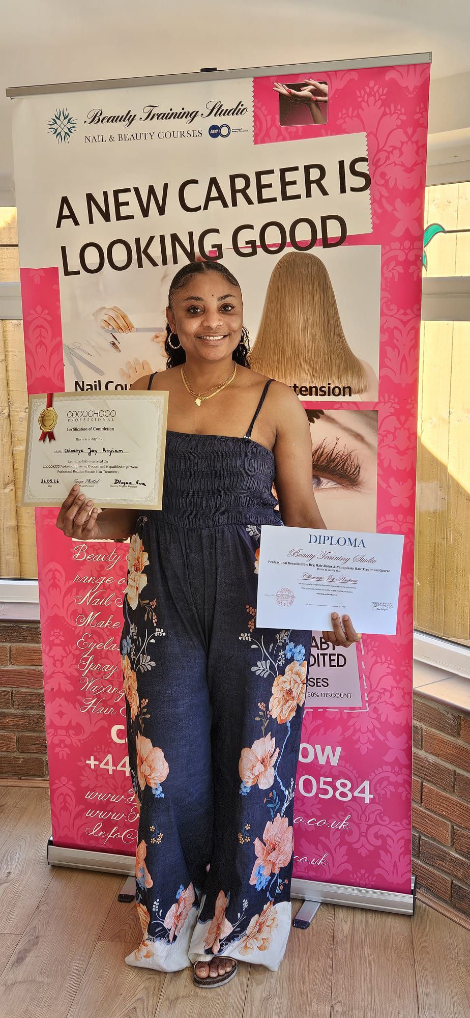 A picture of Neny and her new certifications!!!